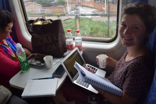 Samantha studying the Kircher book on the train to Hohhot. 