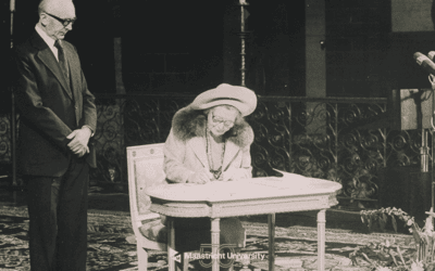 Historical photo of a woman signing a document at Maastricht University Library.