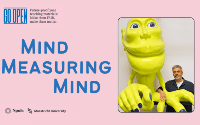 Garmt Dijksterhuis stands beside a bright yellow sensorimotor homunculus: a strange-looking figure whose oversized lips and hands reflect how much brain space is devoted to those sensitive body parts