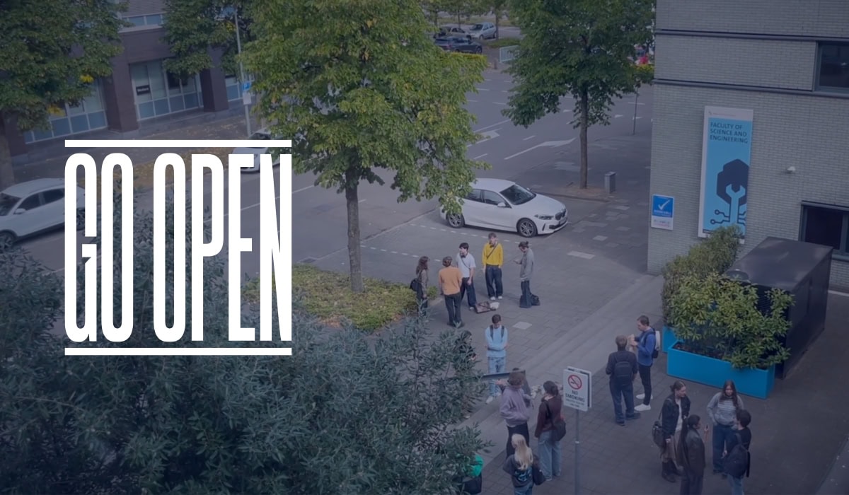 Picture of students in front of a building