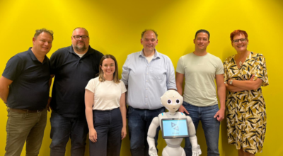 people and a robot