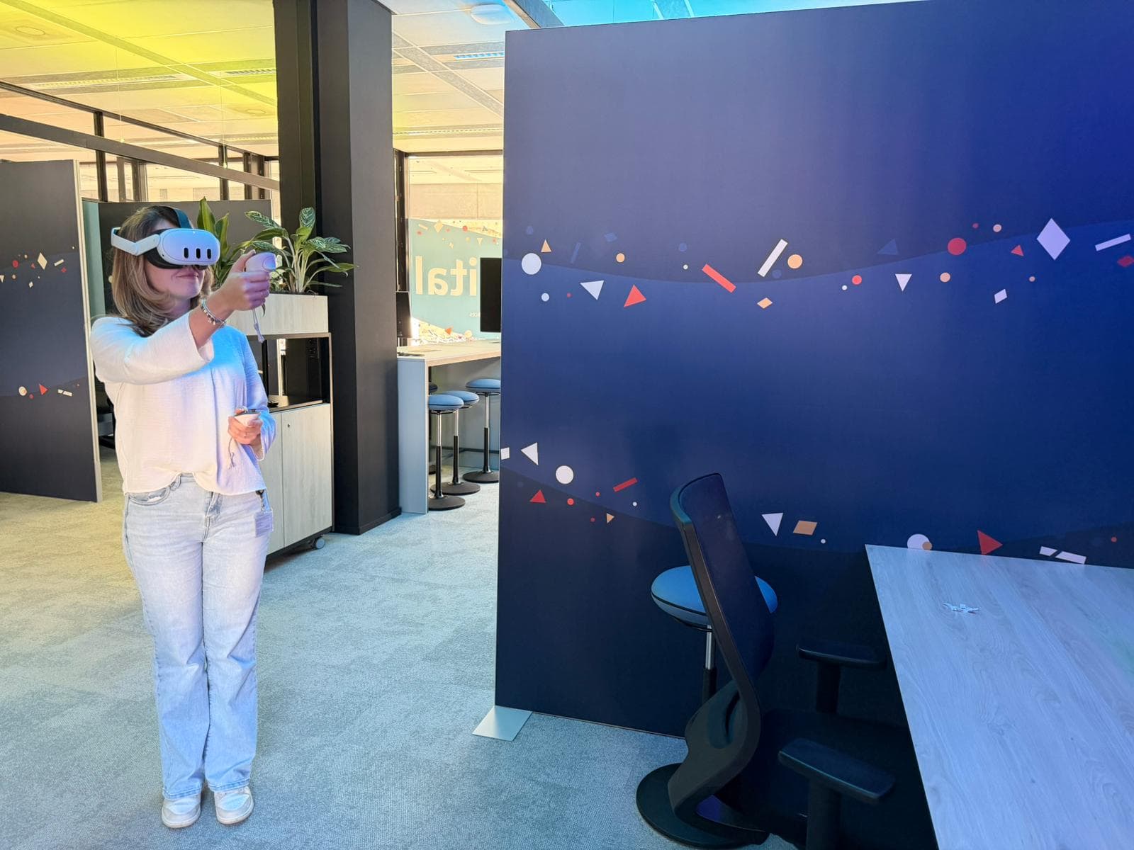 VR headset user exploring virtual environment in educational setting.