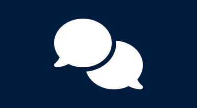 Icon of 2 speech balloons depicting the AI prompt category "Feedback"